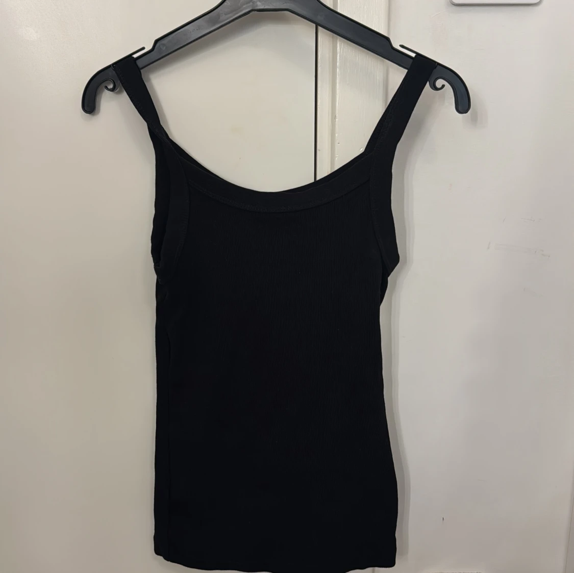 Svart ribbad linnetopp från H&M XS