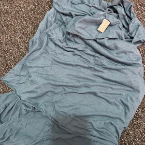 Blå hijab / slöja från Saless London - Blå Jersey hijab/ slöja från hijabfactory. Använd 1 gång 