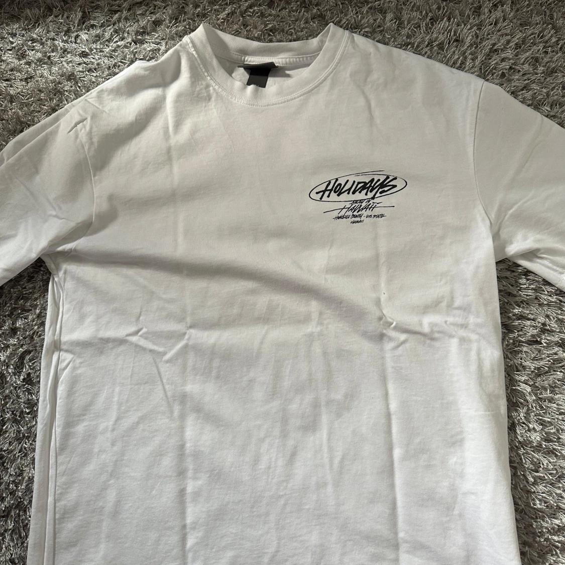 Vit t-shirt med Hawaii-tryck