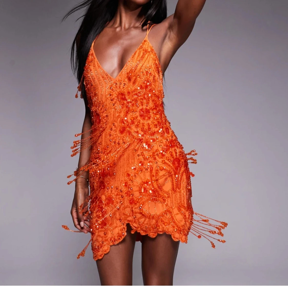 Orange glittrig kortklänning med pärlor - 1