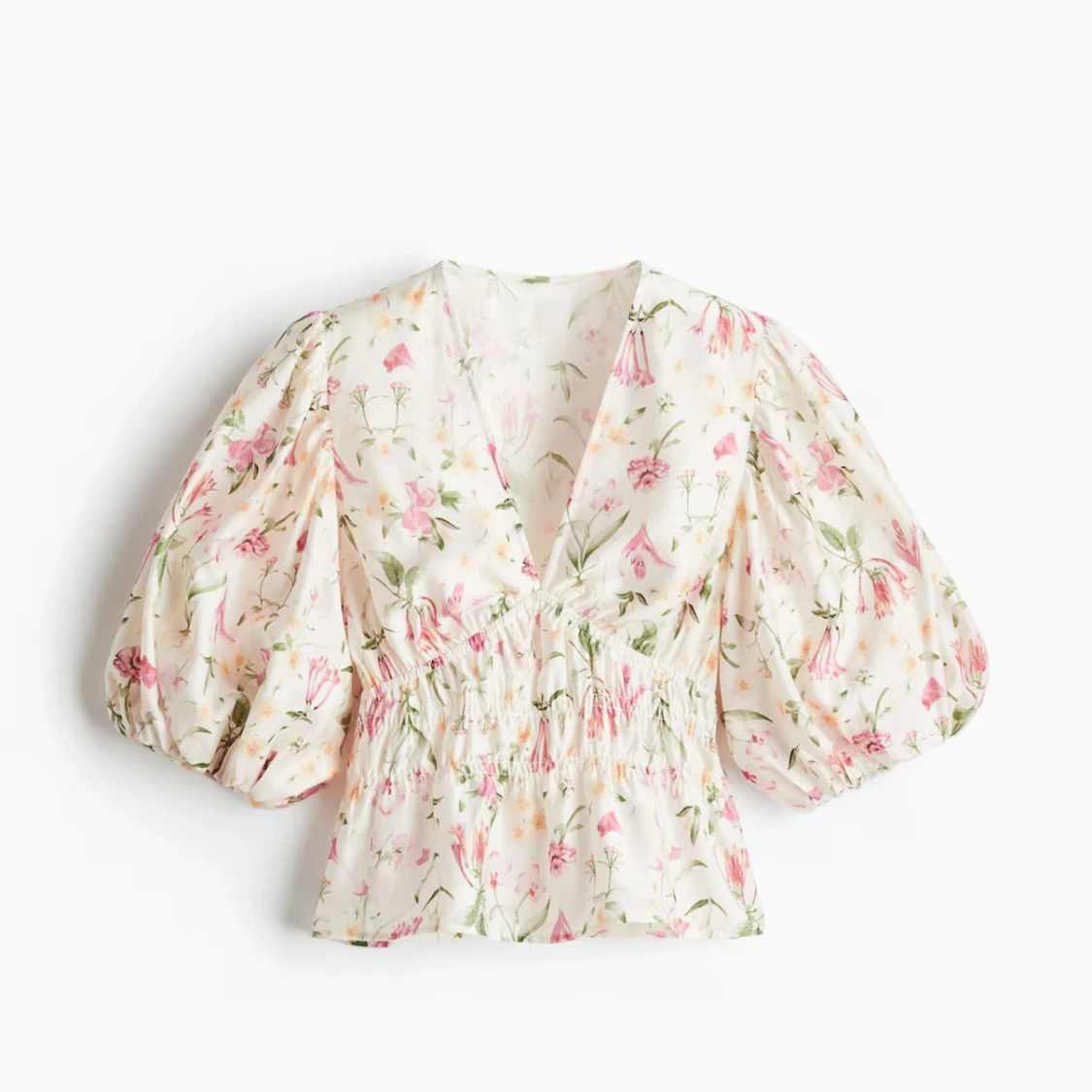 Blommig blus med puffärmar