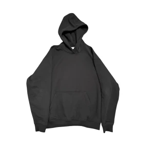 Svart hoodie från Weekday - En klassisk svart hoodie från Weekday med huva och magficka. 