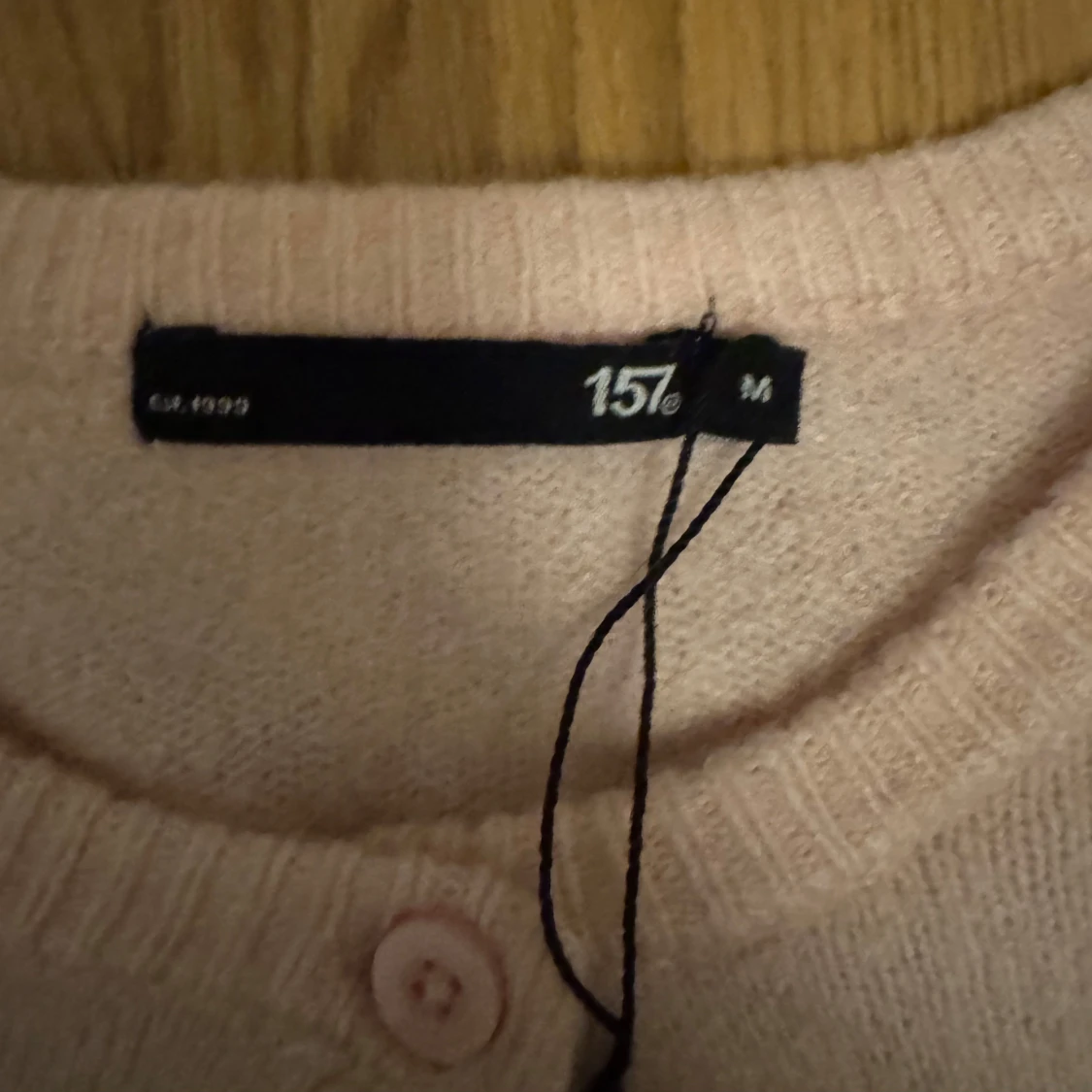 Ljusrosa kofta från 157 - 1