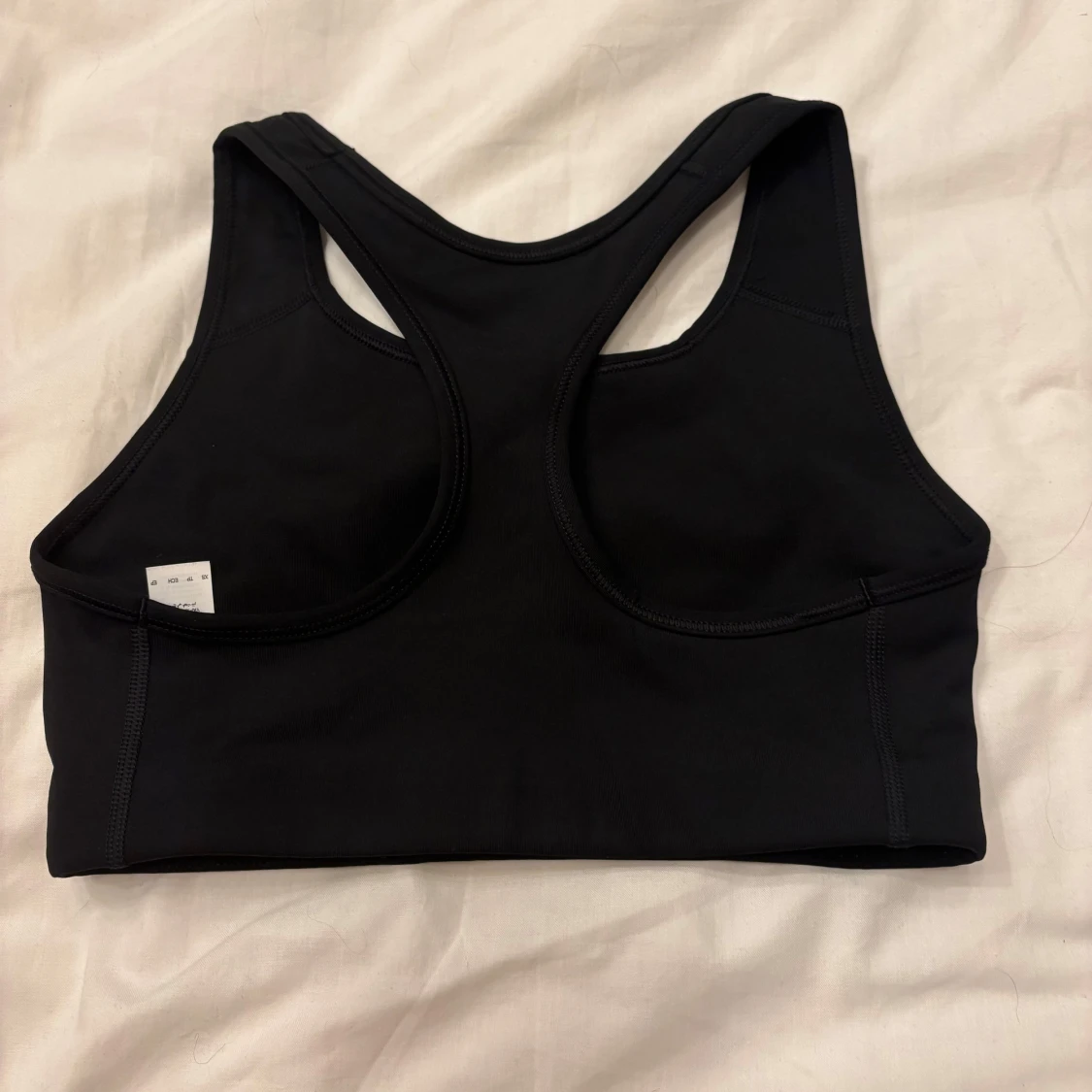 Svart sporttopp från Nike - 1