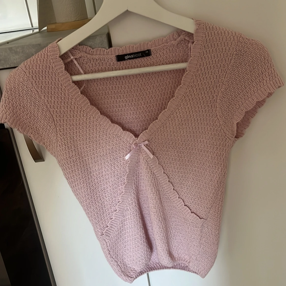 Ljusrosa stickad topp från Gina Tricot