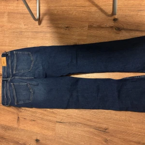 Lågmidjade bootcut jeans  - 💗