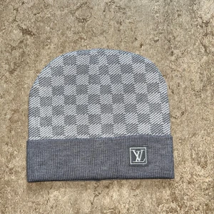 L-V Mössa - Oanvänd 