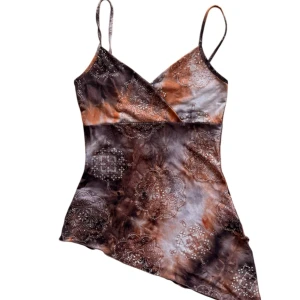 Vintage brun orange asymmetrisk  glittrig linnetopp - Unik asymmetrisk topp. Passar en XS-S. Har en minimal märke på framsidan se sista bild. Men syns inte om man inte tittar extremt noga. 