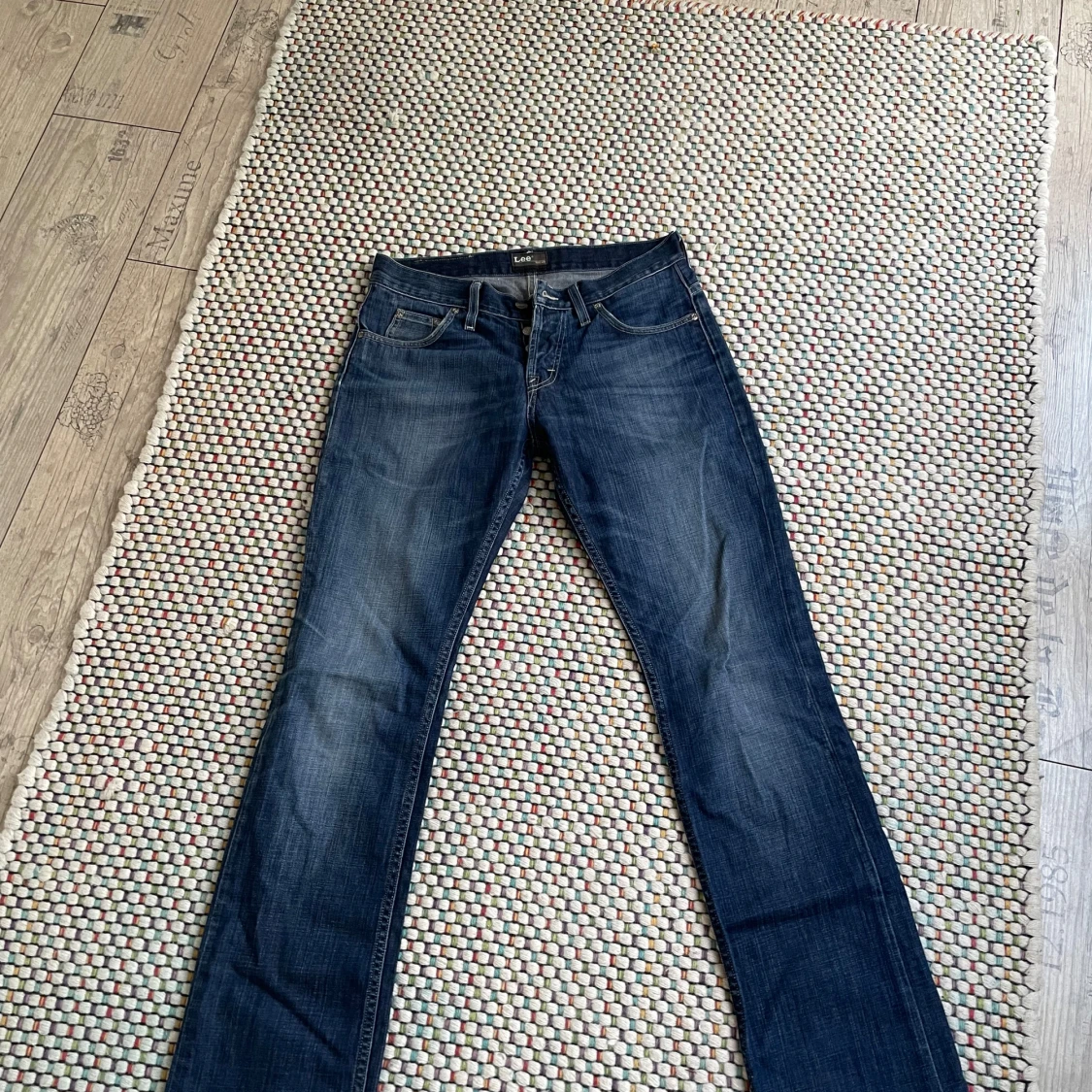 Mörkblå bootcut jeans från Lee