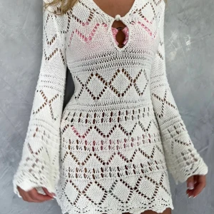 Vit virkad klänning FF swimwear - Så fin vit virkad klänning, perfekt som strandklänning!! Helt ny och med lappen kvar från FF swimwear