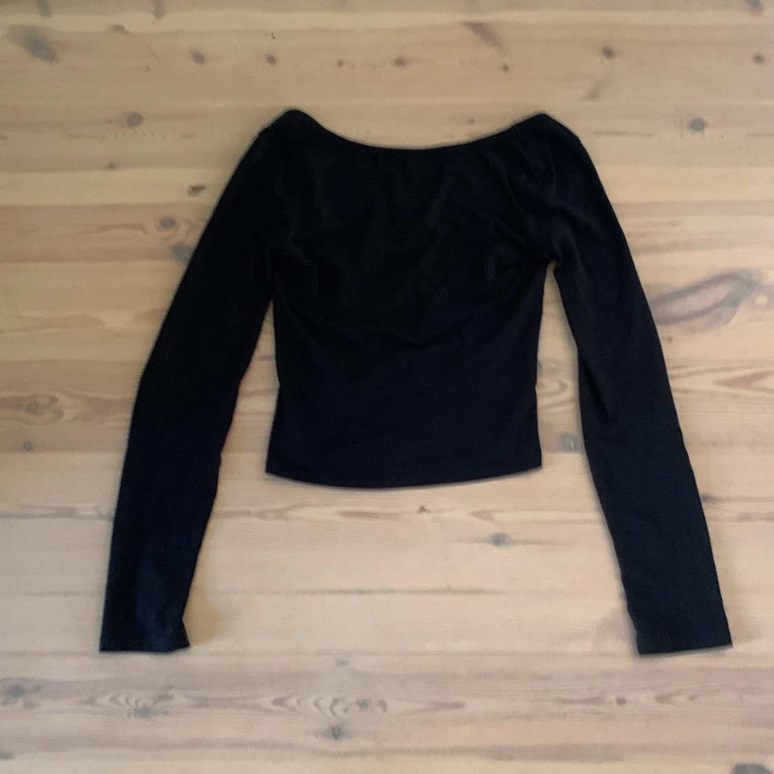 Svart långärmad topp från Gina Tricot