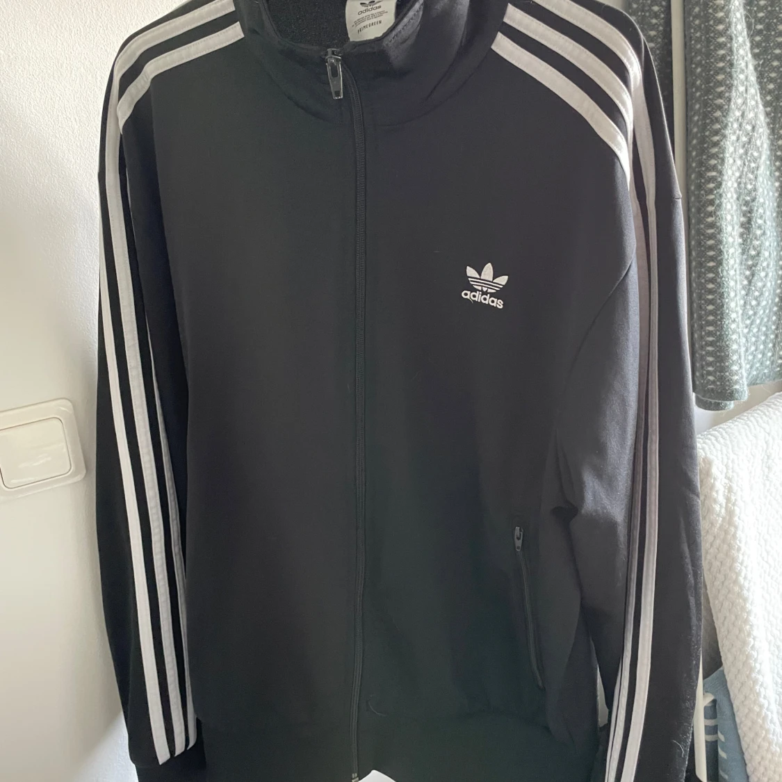 Svart träningsjacka från Adidas