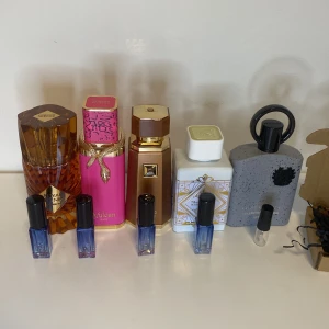 Mix av en premium Aurabox - 5ml Vulcan baie, 5ml royal blend, 5ml liquid brun, 5ml honor and glory och en gratis 2ml sample på Afnan collectors edition.
