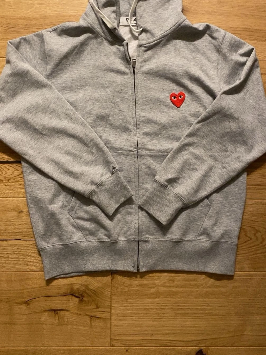 Grå hoodie från Comme des Garçons - 1