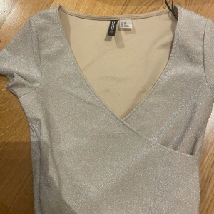 Glittrig silvertröja  - Glittrig tröja för fest