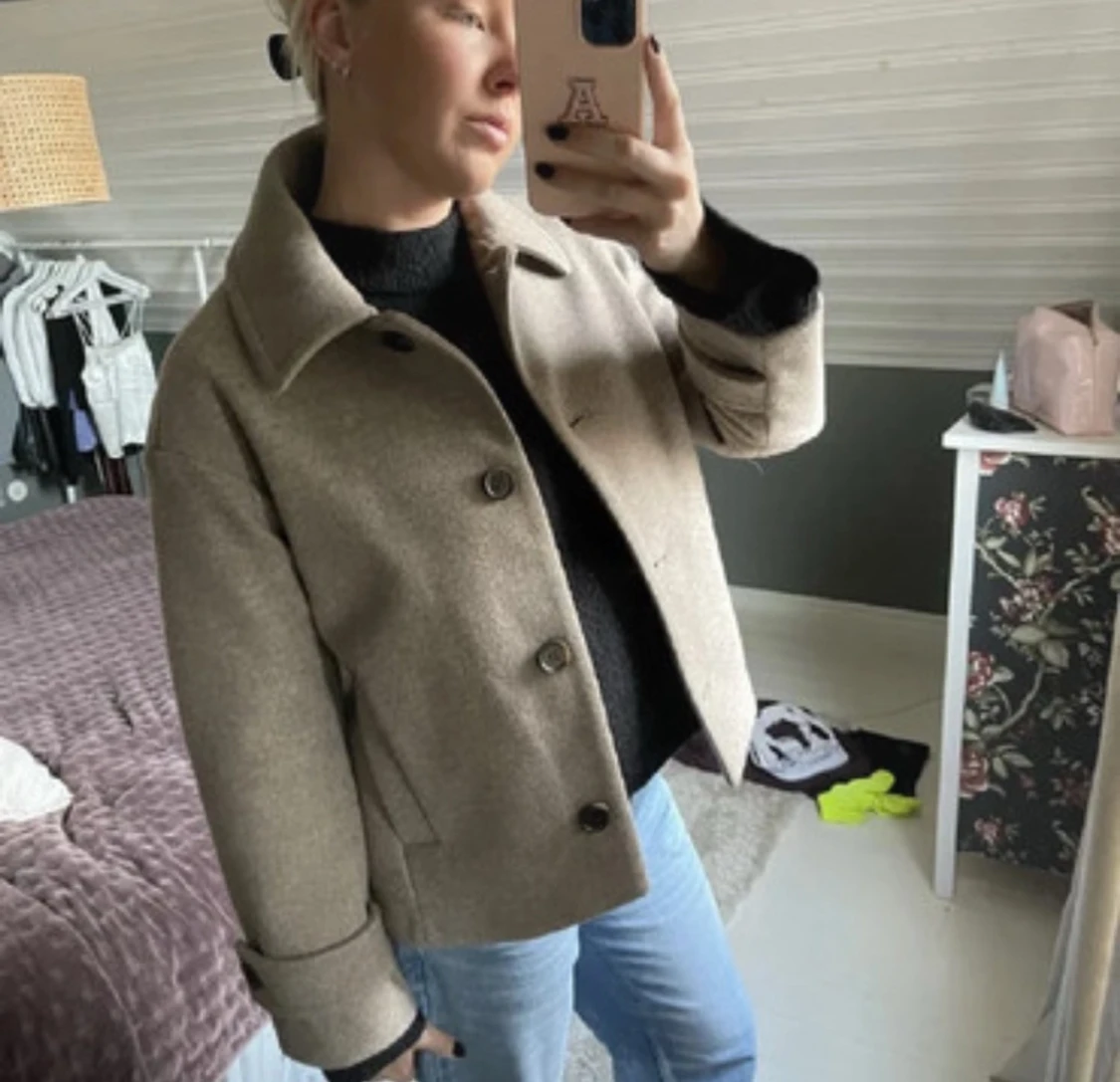 Beige kappa 