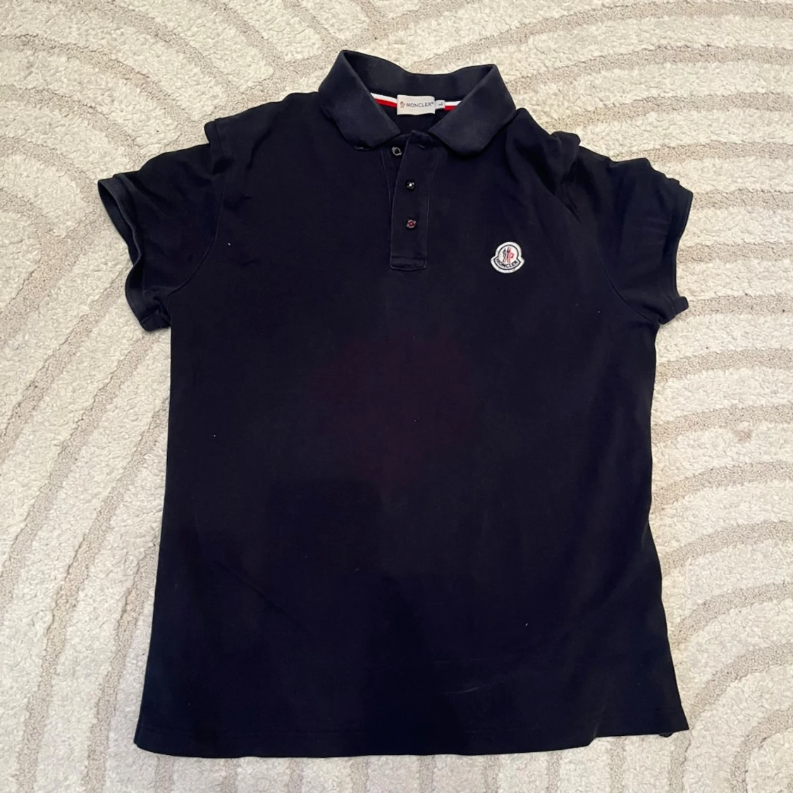 Svart Moncler piké topp