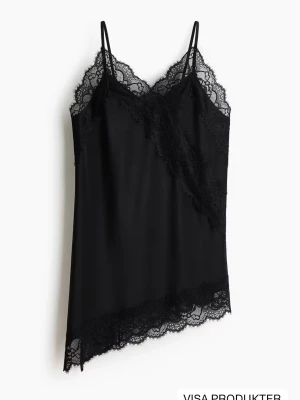 Svart trikåtopp med spetsdetaljer - Söker/byte. Jag har toppen i xs och söker en likadan i storlek S/m