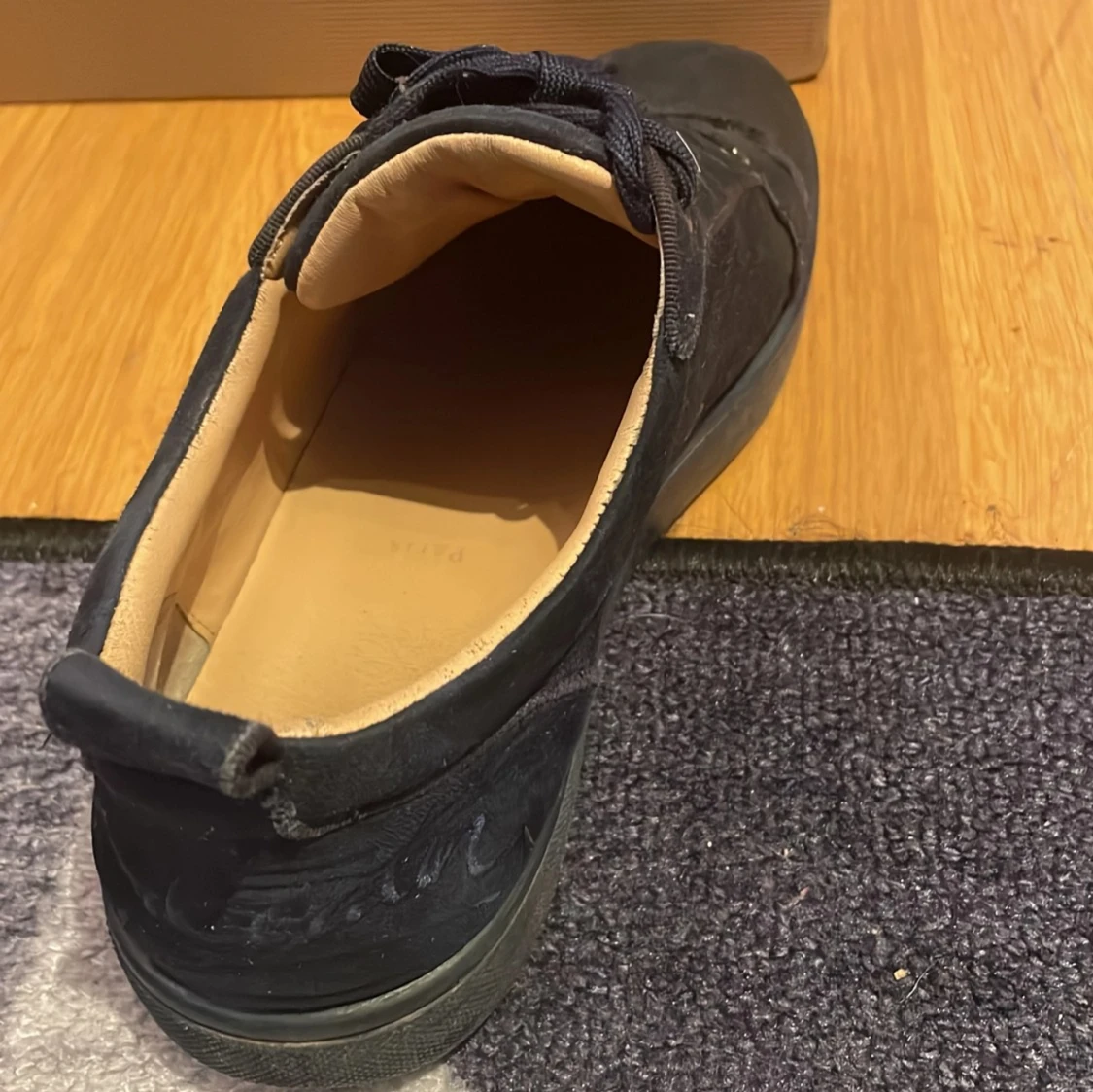 Svarta sneakers från Christian Louboutin - 1