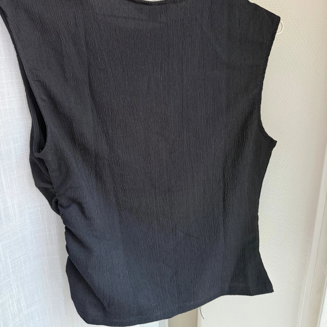 Svart ärmlös topp - 1