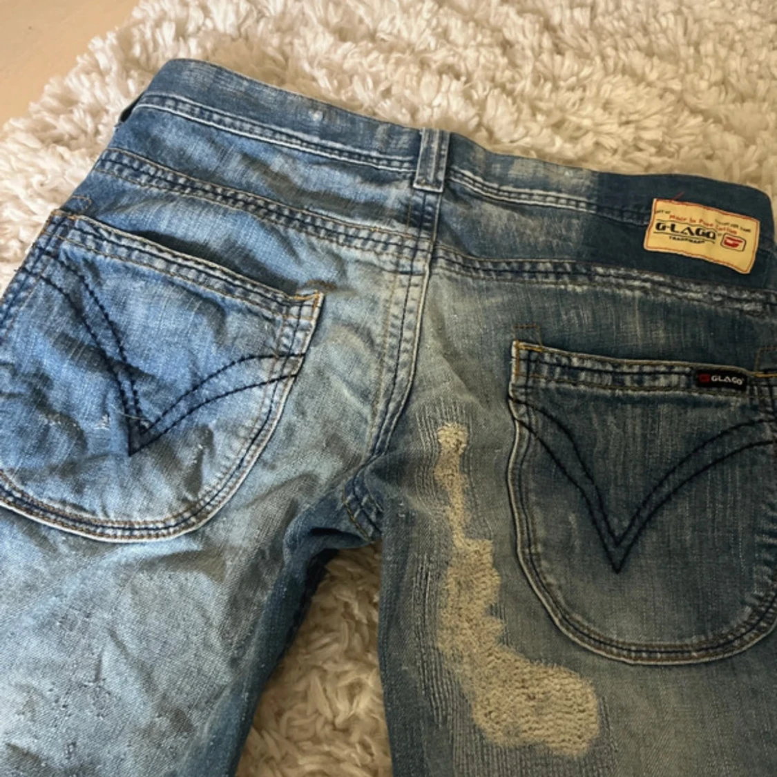 unika lågmidjade bootcut jeans