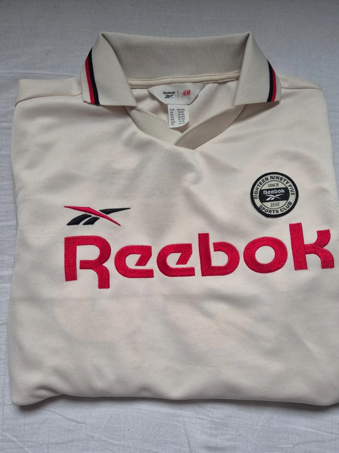 Vit långärmad Reebok x H&M skjorta