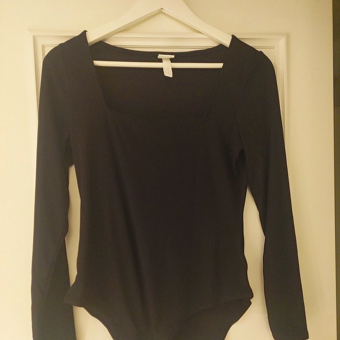 Svart långärmad bodysuit från H&M - 1