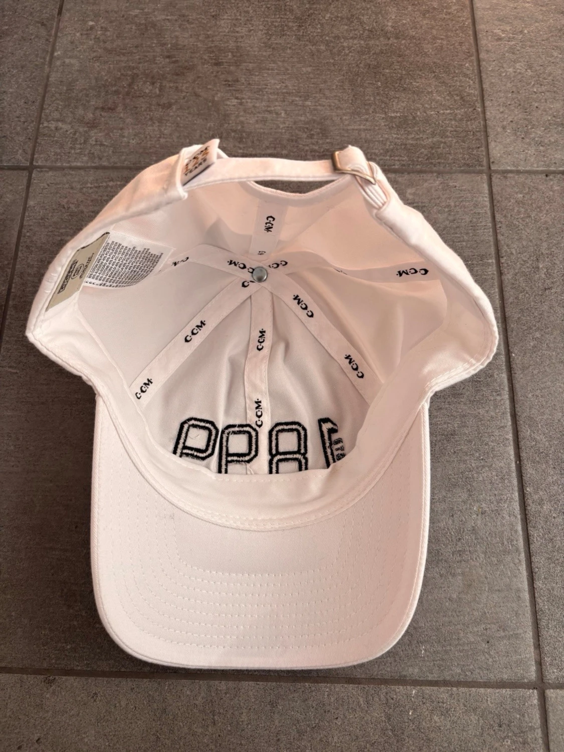 Vit keps från CCM med 1899-tryck - 2