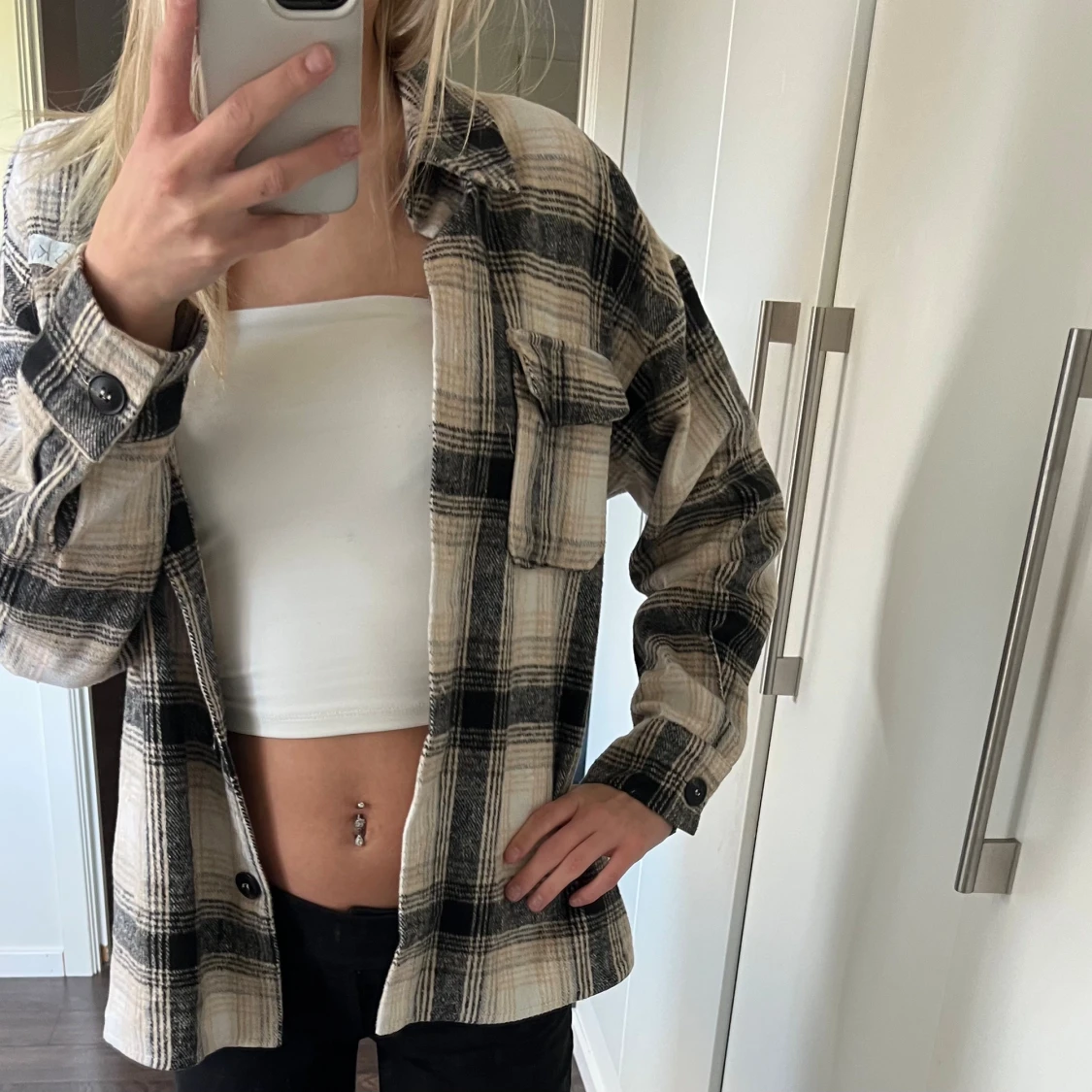 Rutig jacka i beige och svart - 1