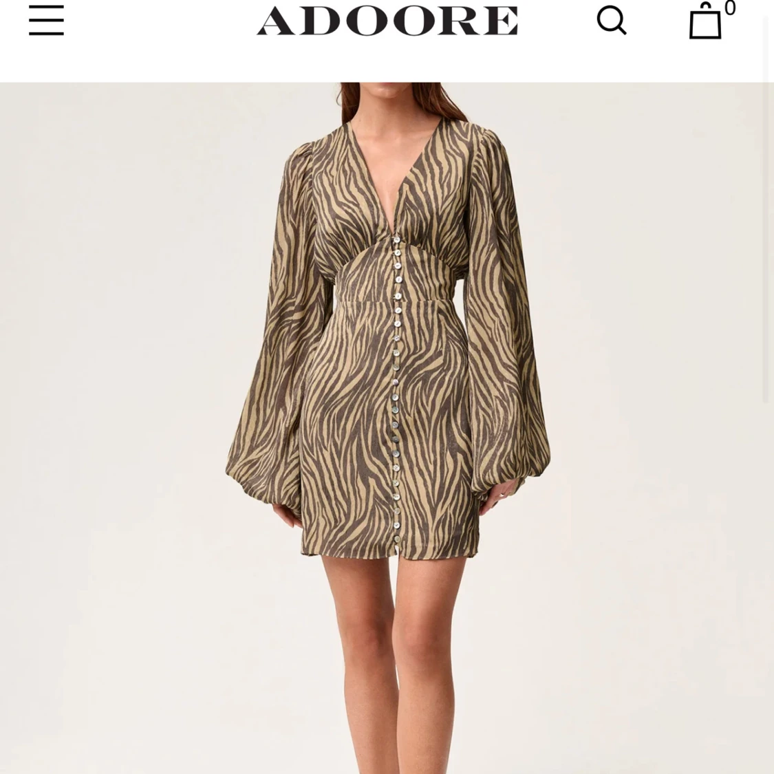 Zebramönstrad kortklänning från Adoore