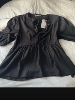 Blus  - Puff ärmad top