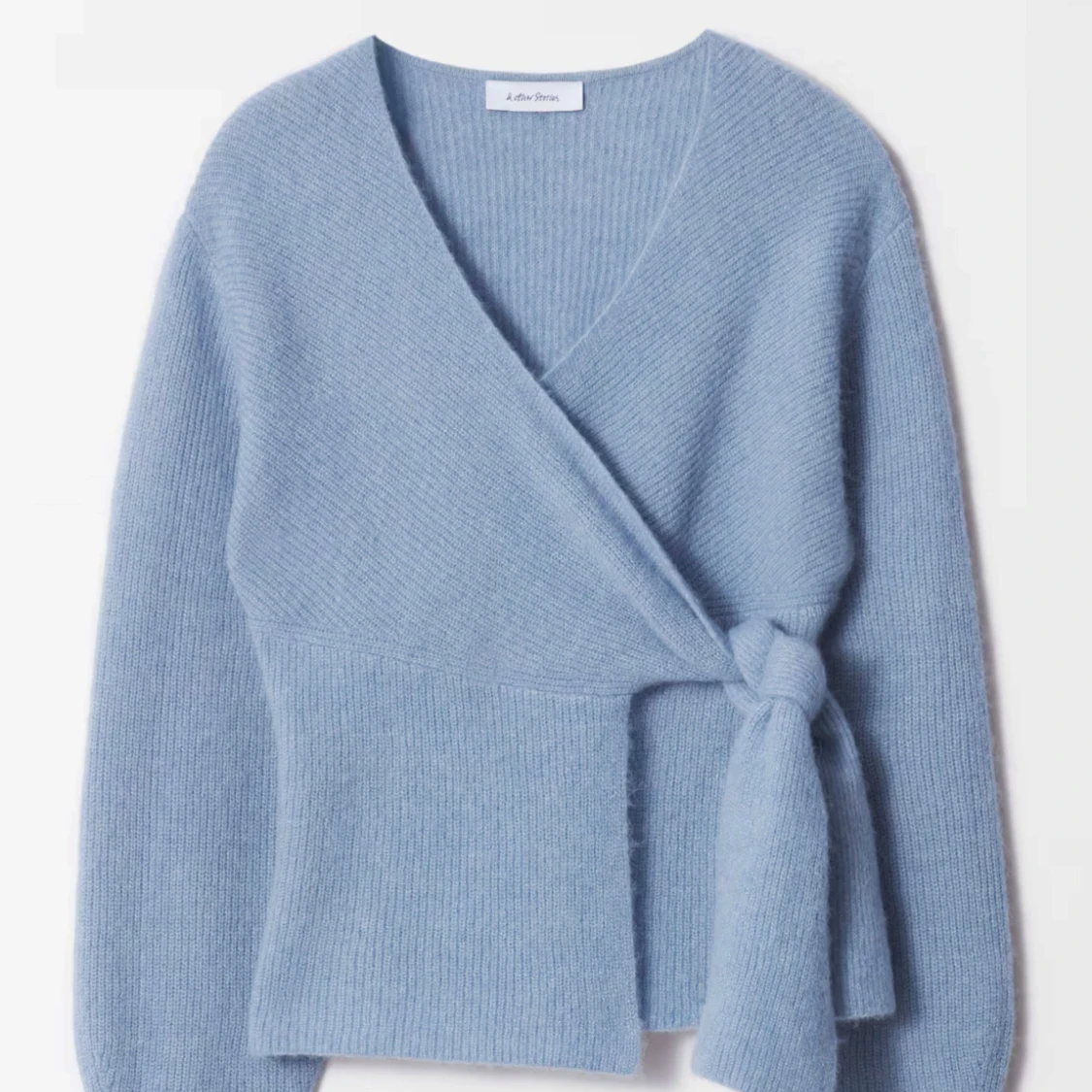 Blå omlottkofta från & Other Stories