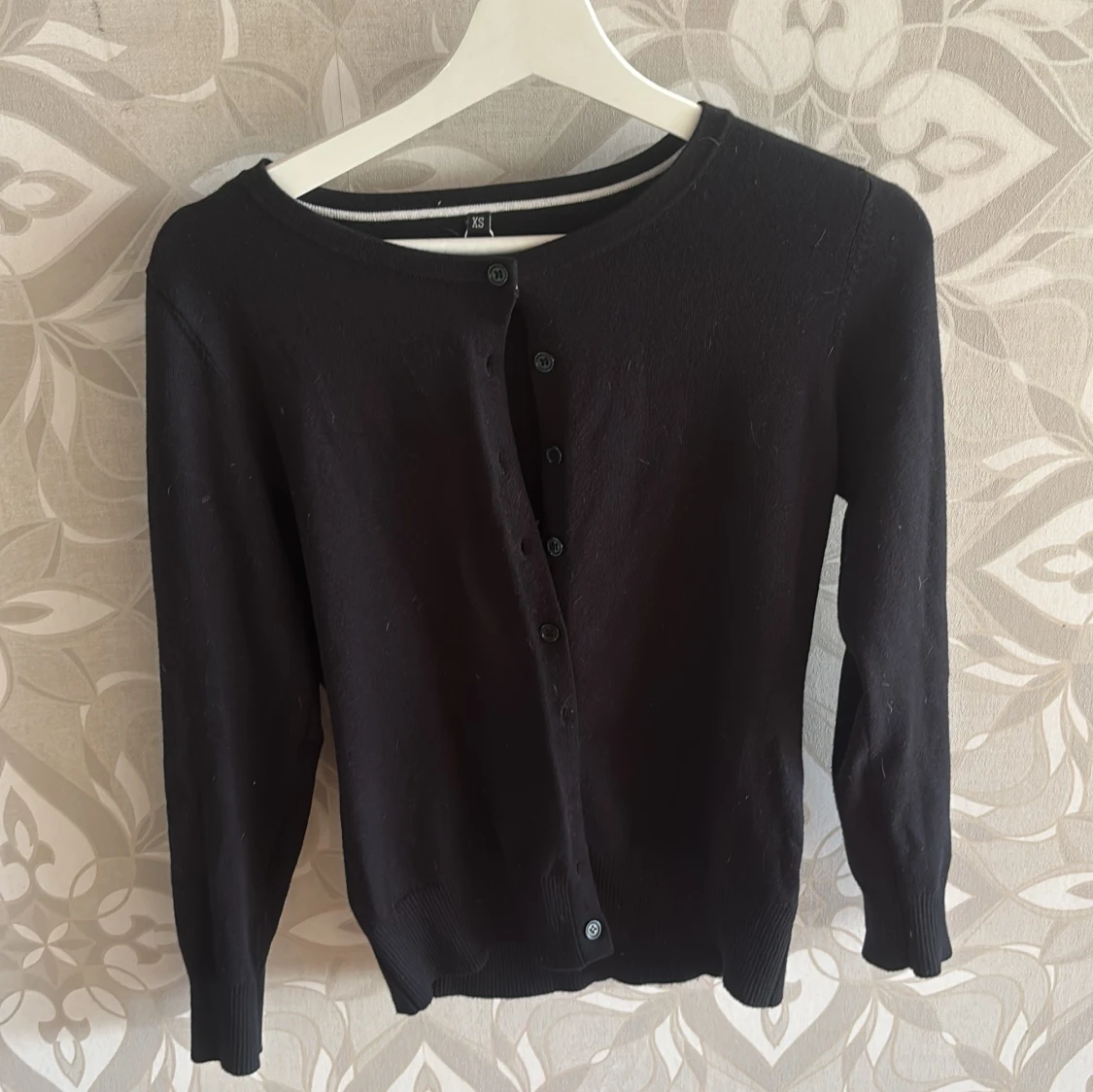 Svart kofta med knappar XS
