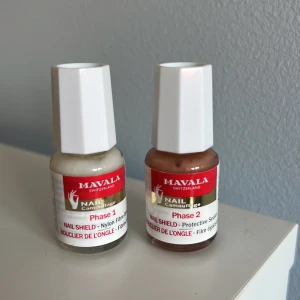 Mavala Nail Shield duo för naglar - Tvåstegssystem från Mavala med Nail Shield Phase 1 (vit, nylonfiberbas) och Phase 2 (beige, skyddande sealer). Testat en gång men inget jag använder.