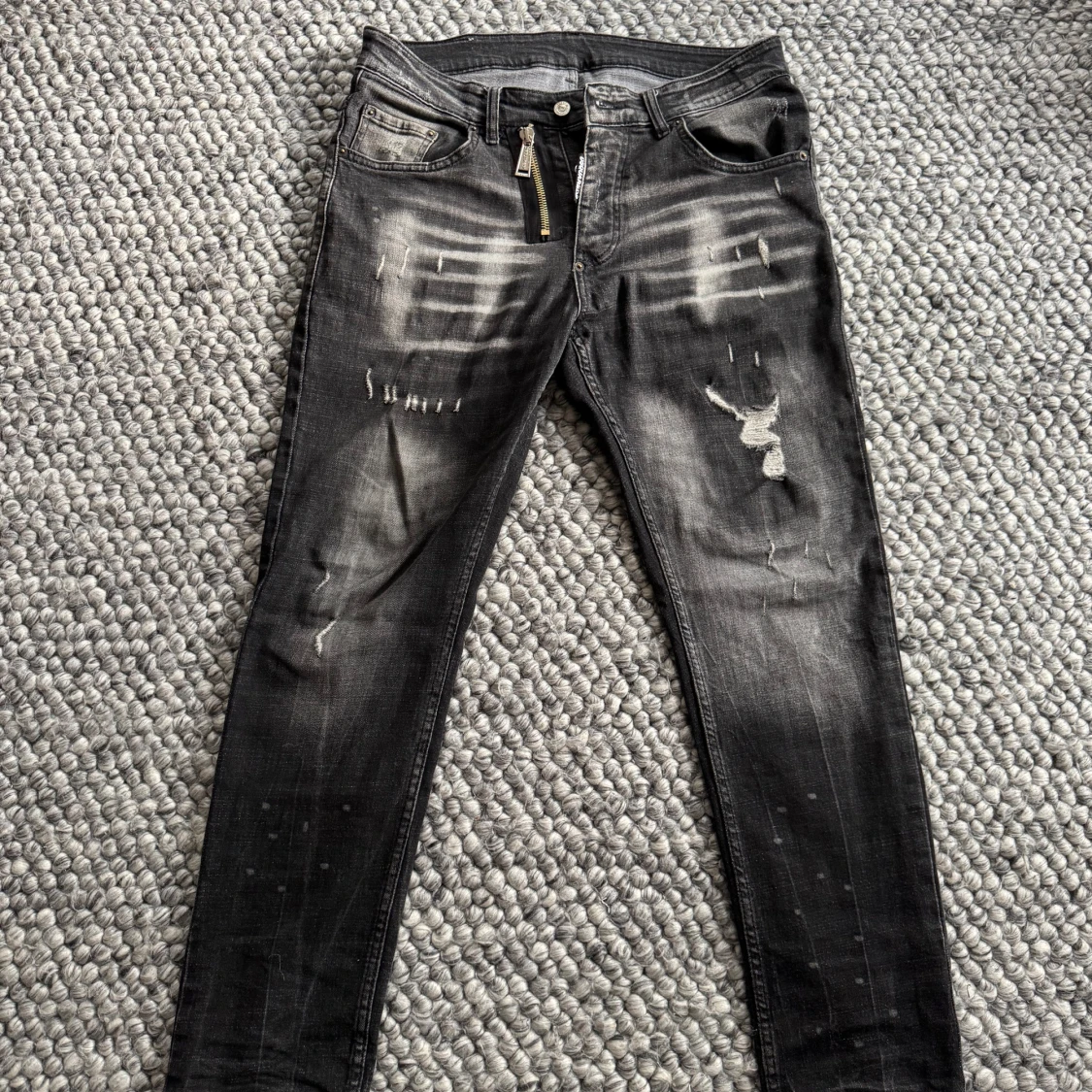 Svarta Dsquared2 skinny jeans med slitningar