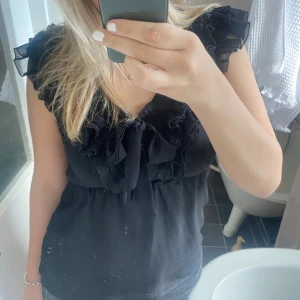 Volangtopp  - Fin volangtopp från h&m