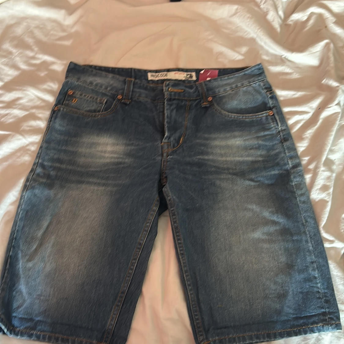 Blå jeansshorts från Indicode