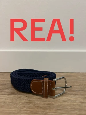 Flätat bälte - Blått flätat bälte. Aldrig använt!