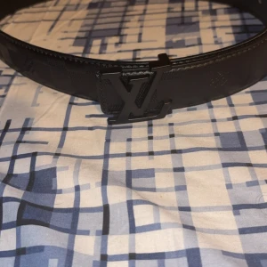 Svart bälte - Svart l-v bälte, 