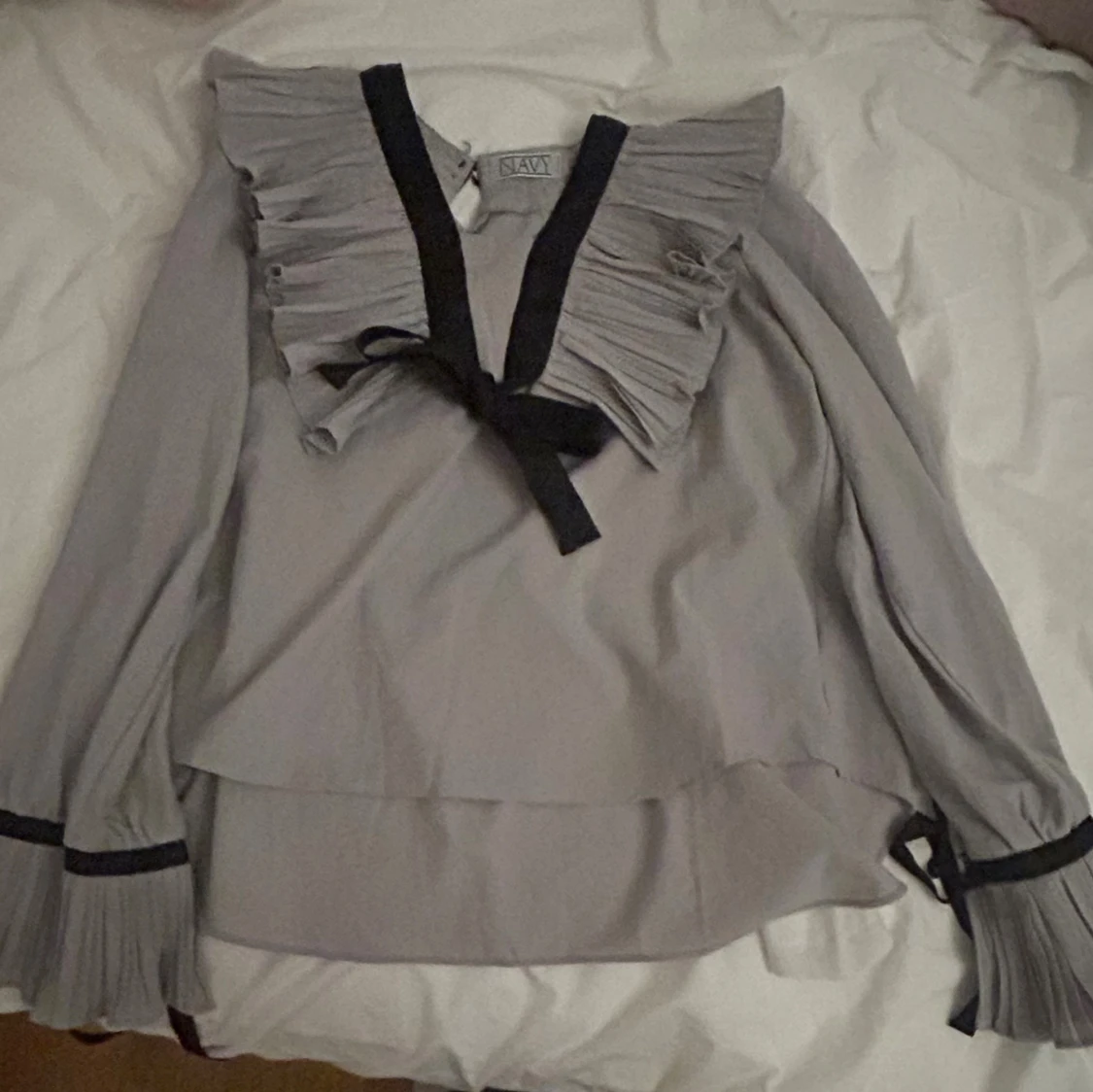 Rosett blus med volang