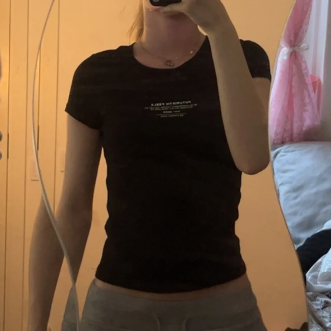 Svart topp med tryck från H&M Divided XS