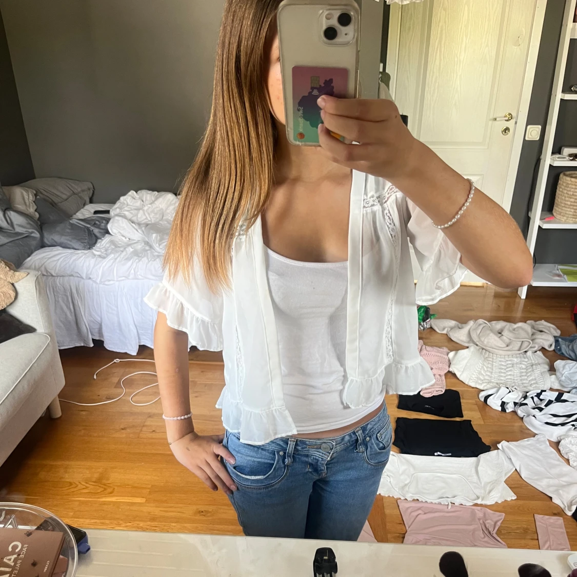 Vit blus med volanger från H&M