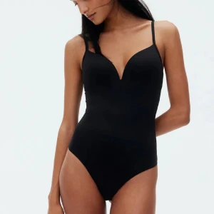 Svart H&M body - Jättefin body från H&M