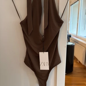 Halterneck body  - Oanvänd med prislapp kvar 