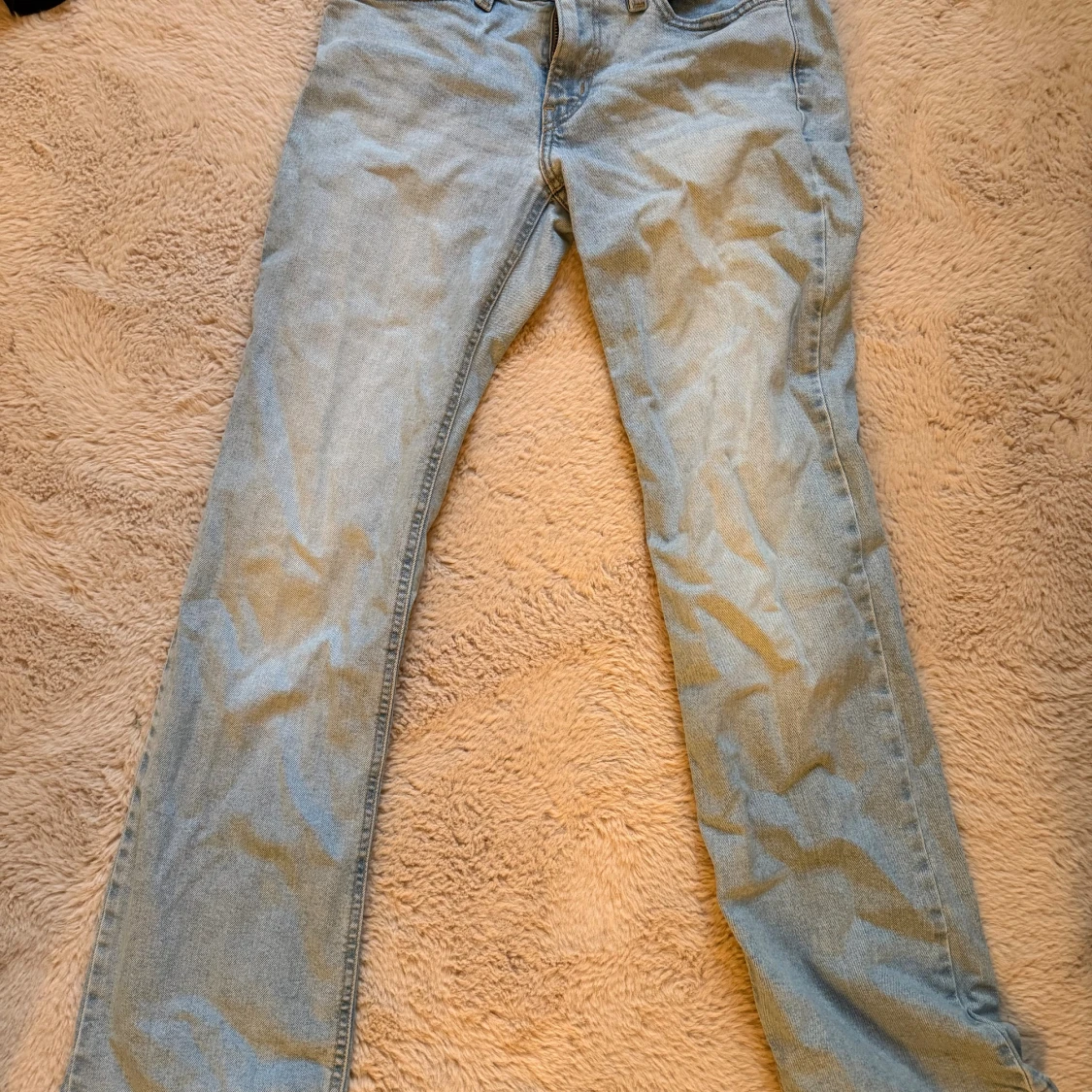 Levi's ljusblå jeans Superlow Boot