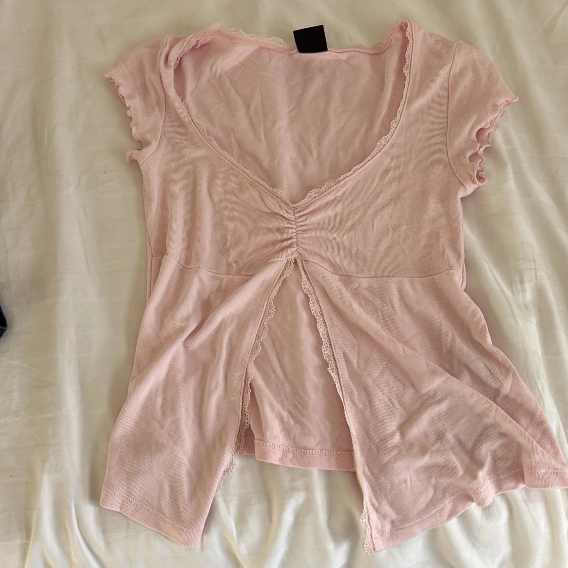 Ljusrosa omlottopp från Gina Tricot - 1