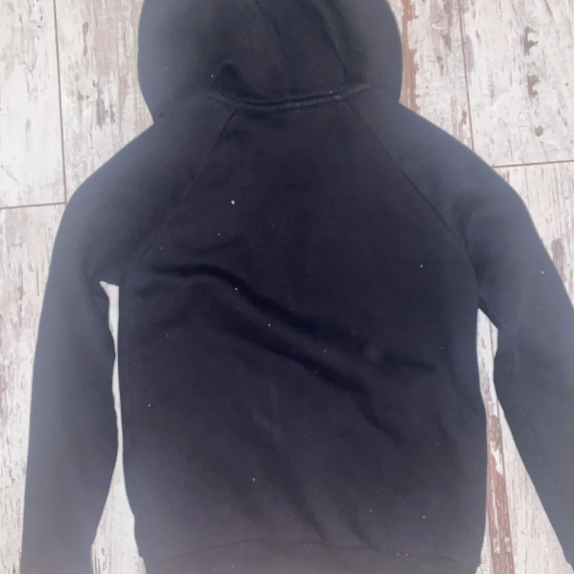 Svart hoodie Peak Performance XS