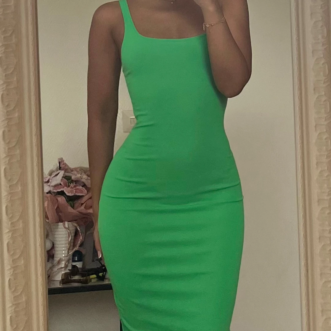 Grön tight ärmlös klänning