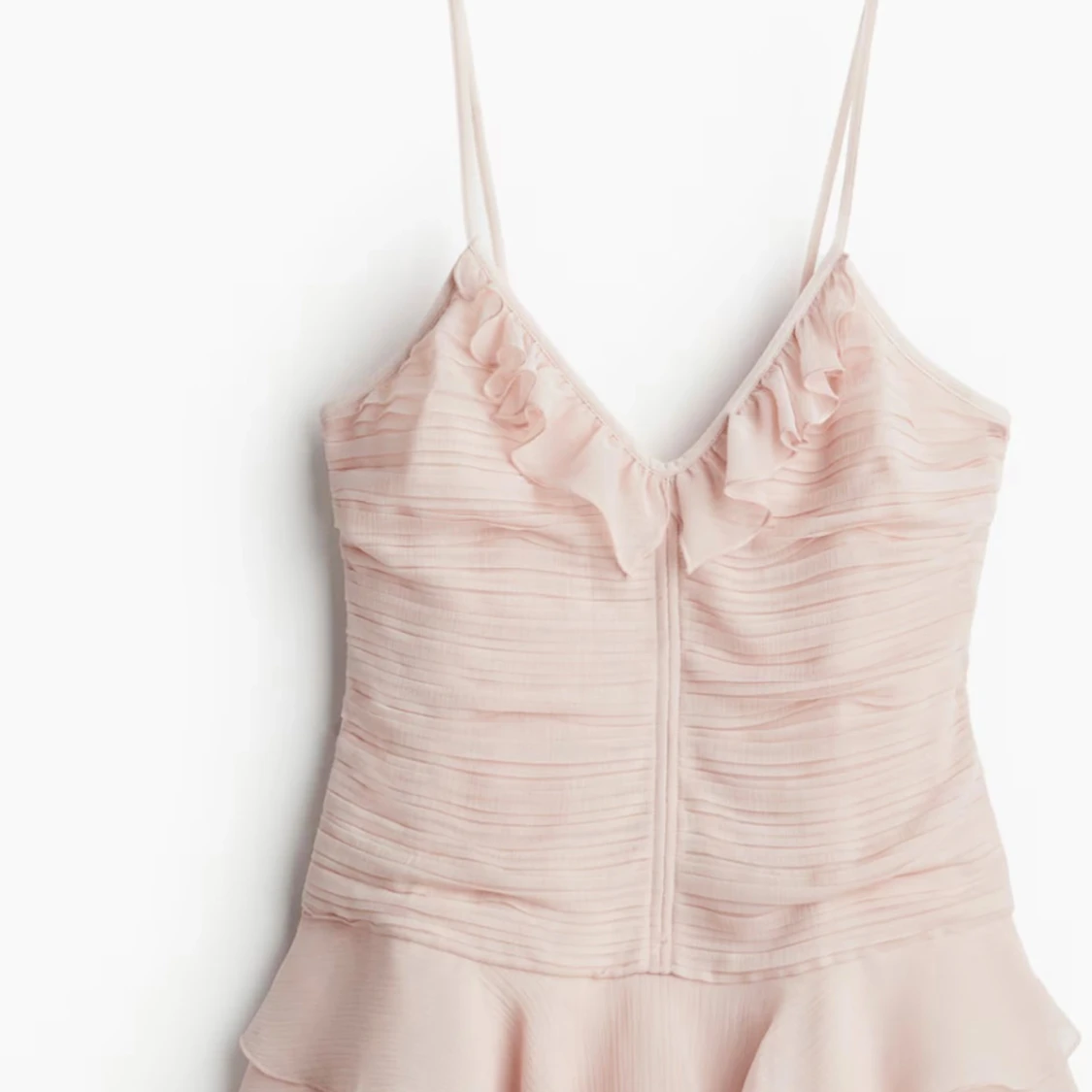 Ljusrosa volangklänning från H&M