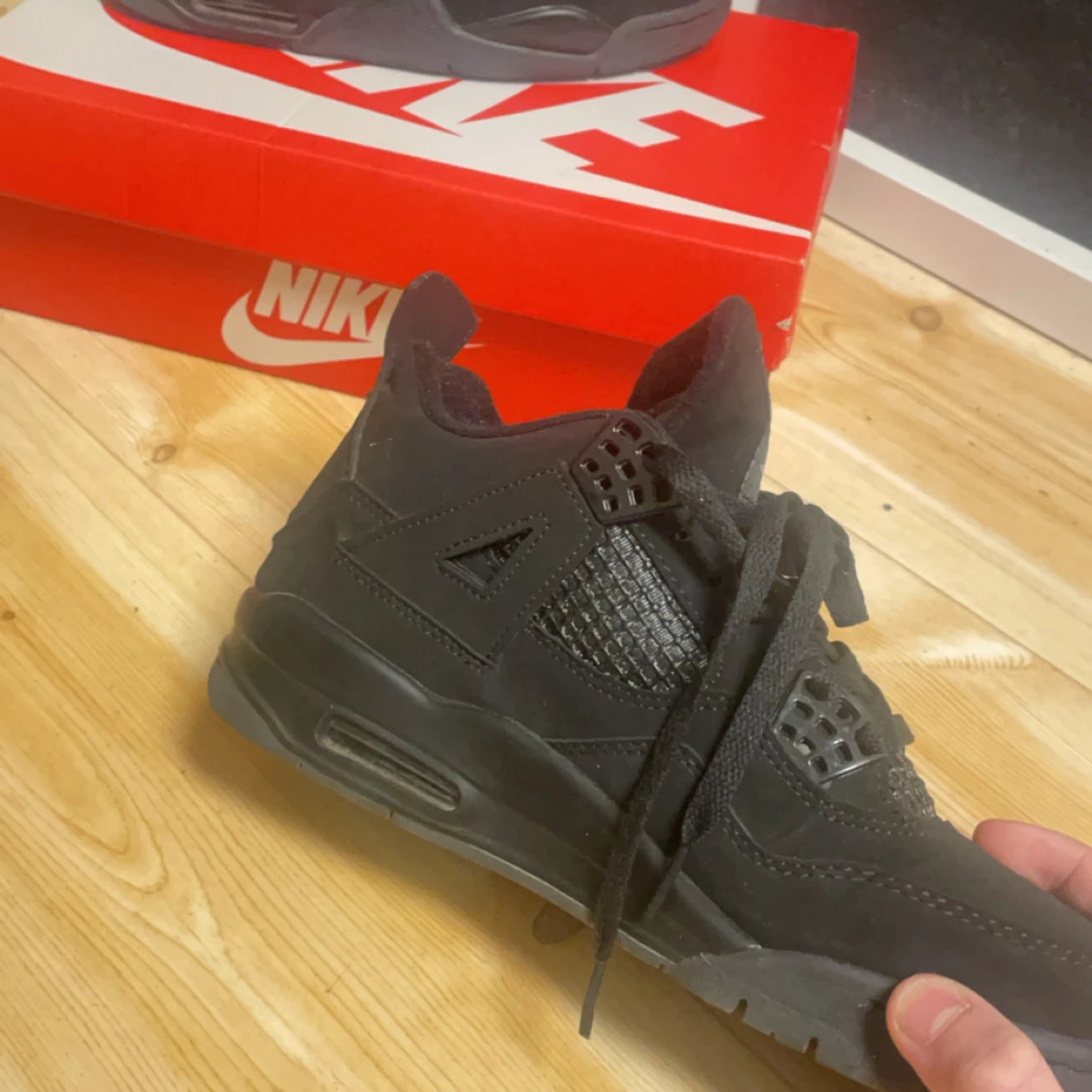 Nike Air Jordan 4 Retro Svart - 1